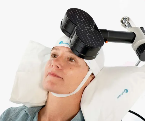 Patient receiving TMS treatment